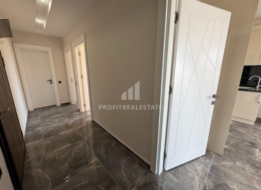 Трехкомнатная квартира с чистовой отделкой, 80м², в новой резиденции на центральной улице Махмутлара, Алания ID-19430 фото-6