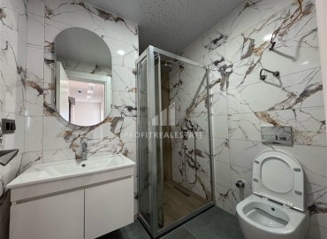 Трехкомнатная квартира с чистовой отделкой, 80м², в новой резиденции на центральной улице Махмутлара, Алания ID-19430 фото-12