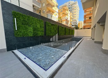Трехкомнатная квартира с чистовой отделкой, 80м², в новой резиденции на центральной улице Махмутлара, Алания ID-19430 фото-24