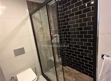 Видовая меблированная квартира с одной спальней, 55м², в элитном комплексе в Махмутларе, Алания ID-19431 фото-7