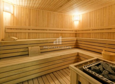 Видовая меблированная квартира с одной спальней, 55м², в элитном комплексе в Махмутларе, Алания ID-19431 фото-19