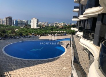 Видовая меблированная квартира с одной спальней, 55м², в элитном комплексе в Махмутларе, Алания ID-19431 фото-25