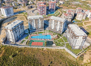 Уютная квартира с одной спальней, 60м² с видом на море в элитном комплексе в 900м от пляжа Инджекум в Авсалларе, Алания ID-19439 фото-1