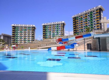 Новая квартира 1+1, 55м² с чистовой отделкой в элитном комплексе от ведущего застройщика, в районе Авсаллар, Алания ID-19441 фото-14
