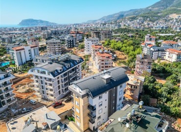 Квартира с одной спальней, 50м², с чистовой отделкой в новой резиденции с инфраструктурой в районе Оба, Алания ID-19449 фото-16