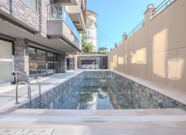 Стильная квартира 1+1, 55м², с личным садом 30м² в современном комплексе с инфраструктурой в районе Оба, Алания ID-19451 фото-19
