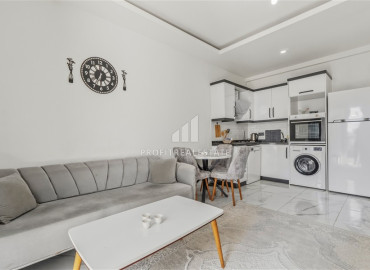 Элегантная двухкомнатная квартира, 50м², в новом комплексе с хорошей инфраструктурой в Махмутларе, Алания, по привлекательной цене ID-19641 фото-2