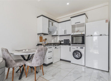 Элегантная двухкомнатная квартира, 50м², в новом комплексе с хорошей инфраструктурой в Махмутларе, Алания, по привлекательной цене ID-19641 фото-6
