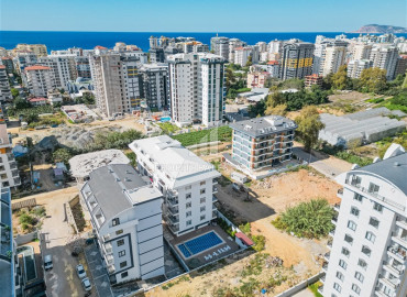 Элегантная двухкомнатная квартира, 50м², в новом комплексе с хорошей инфраструктурой в Махмутларе, Алания, по привлекательной цене ID-19641 фото-15