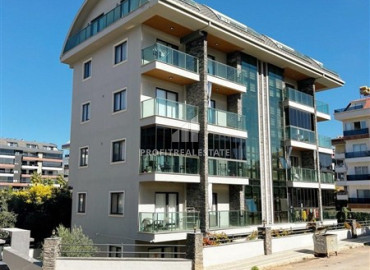 Меблированная двухкомнатная квартира, 50м², в уютном комплексе у подножия гор в районе Оба, Алания. ID-19476 фото-1