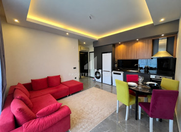 Меблированная двухкомнатная квартира, 50м², в уютном комплексе у подножия гор в районе Оба, Алания. ID-19476 фото-2