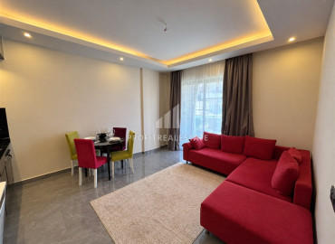 Меблированная двухкомнатная квартира, 50м², в уютном комплексе у подножия гор в районе Оба, Алания. ID-19476 фото-3