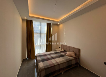 Меблированная двухкомнатная квартира, 50м², в уютном комплексе у подножия гор в районе Оба, Алания. ID-19476 фото-6