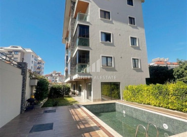 Меблированная двухкомнатная квартира, 50м², в уютном комплексе у подножия гор в районе Оба, Алания. ID-19476 фото-12