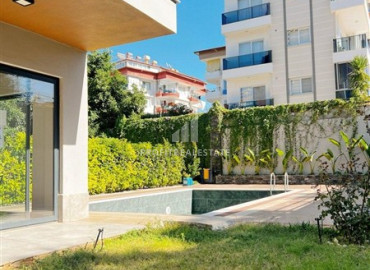 Меблированная двухкомнатная квартира, 50м², в уютном комплексе у подножия гор в районе Оба, Алания. ID-19476 фото-13