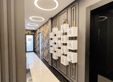 Меблированная двухкомнатная квартира, 50м², в уютном комплексе у подножия гор в районе Оба, Алания. ID-19476 фото-14