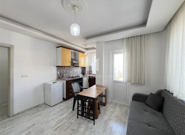 Меблированная двухкомнатная квартира, 45м², в районе Муратпаша, Анталия, по отличной цене ID-19478 фото-1