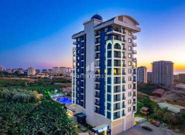 Видовые двухкомнатные апартаменты, 54м², в новостройке премиум класса в районе Махмутлар, Алания ID-19483 фото-1