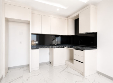 Видовые двухкомнатные апартаменты, 54м², в новостройке премиум класса в районе Махмутлар, Алания ID-19483 фото-3