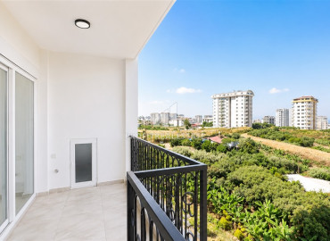 Видовые двухкомнатные апартаменты, 54м², в новостройке премиум класса в районе Махмутлар, Алания ID-19483 фото-6
