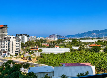 Видовые двухкомнатные апартаменты, 54м², в новостройке премиум класса в районе Махмутлар, Алания ID-19483 фото-8
