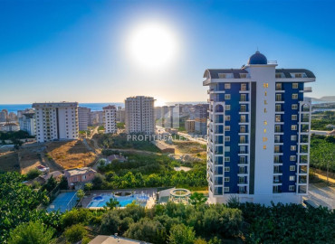 Видовые двухкомнатные апартаменты, 54м², в новостройке премиум класса в районе Махмутлар, Алания ID-19483 фото-15
