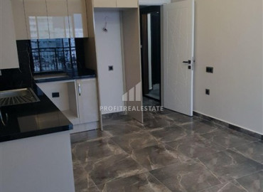 Апартаменты с одной спальней, 60м², в новой комфортабельной резиденции на центральной улице Махмутлара, Алания ID-19484 фото-4