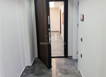 Апартаменты с одной спальней, 60м², в новой комфортабельной резиденции на центральной улице Махмутлара, Алания ID-19484 фото-5