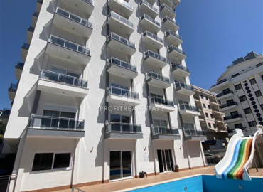 Готовая к проживанию, двухкомнатная квартира, 50м², в комфортабельном комплексе в Махмутларе, Алания ID-19486 фото-1