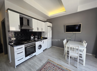 Готовая к проживанию, двухкомнатная квартира, 50м², в комфортабельном комплексе в Махмутларе, Алания ID-19486 фото-4