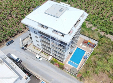 Двухкомнатная квартира, 52м², в комфортабельном комплексе с зимней инфраструктурой в Махмутларе, Алания ID-19489 фото-1