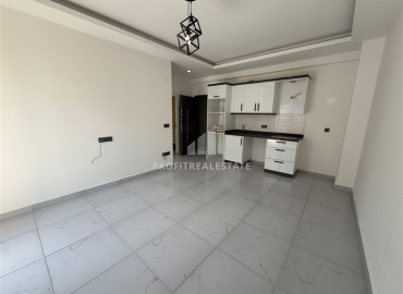 Двухкомнатная квартира, 52м², в комфортабельном комплексе с зимней инфраструктурой в Махмутларе, Алания ID-19489 фото-2