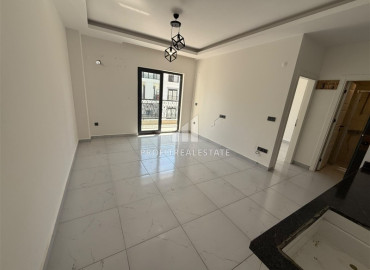 Двухкомнатная квартира, 52м², в комфортабельном комплексе с зимней инфраструктурой в Махмутларе, Алания ID-19489 фото-3