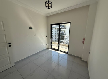 Двухкомнатная квартира, 52м², в комфортабельном комплексе с зимней инфраструктурой в Махмутларе, Алания ID-19489 фото-9