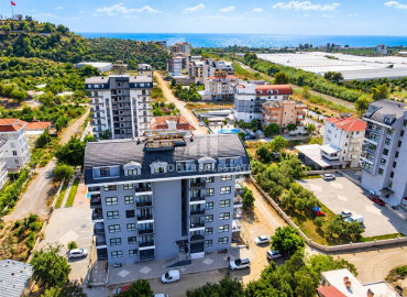 Двухкомнатная квартира, 50м², в новом комплексе с комфортной инфраструктурой в районе Алании - Демирташ ID-19494 фото-9