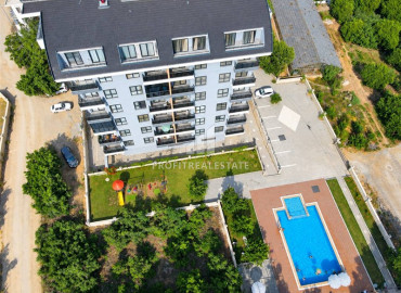 Двухкомнатная квартира, 50м², в новом комплексе с комфортной инфраструктурой в районе Алании - Демирташ ID-19494 фото-11