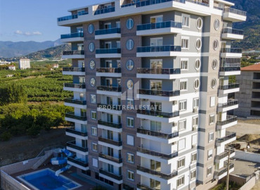Меблированные апартаменты с двумя спальнями, 110м² в комфортабельном комплексе в Махмутларе, Алания ID-19487 фото-1