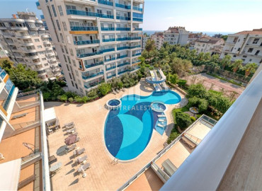 Стильная квартира с одной спальней, 65м², с видом на море в элитном комплексе в районе Алании - Тосмур ID-19469 фото-23