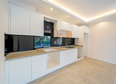 Новая квартира с двумя спальнями, 109м², в новостройке премиум класса в центре Алании, 1400м от моря ID-19497 фото-3