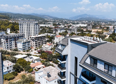 Частично меблированные двухкомнатные апартаменты, 55м², в новом комплексе премиум класса в Авсалларе, Алания ID-19498 фото-26