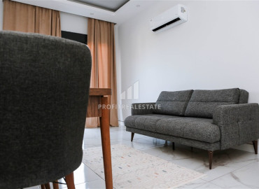 Частично меблированные двухкомнатные апартаменты, 55м², в новом комплексе премиум класса в Авсалларе, Алания ID-19498 фото-7