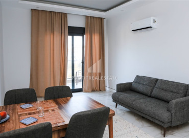 Частично меблированные двухкомнатные апартаменты, 55м², в новом комплексе премиум класса в Авсалларе, Алания ID-19498 фото-9