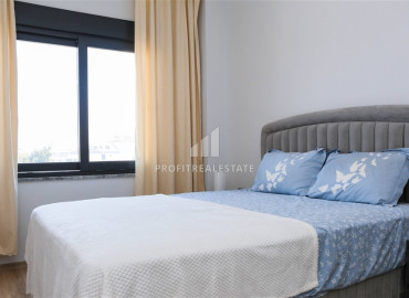 Частично меблированные двухкомнатные апартаменты, 55м², в новом комплексе премиум класса в Авсалларе, Алания ID-19498 фото-11