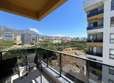 Элегантная двухкомнатная квартира, 42м², в элитной резиденции в 850м от моря в Махмутларе, Алания ID-19505 фото-10