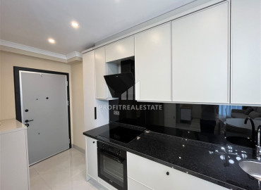 Элегантная двухкомнатная квартира, 42м², в элитной резиденции в 850м от моря в Махмутларе, Алания ID-19505 фото-4