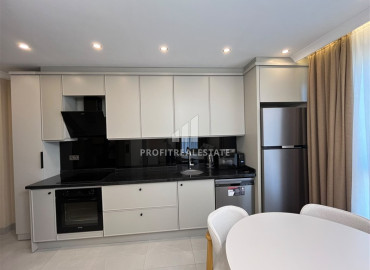 Элегантная двухкомнатная квартира, 42м², в элитной резиденции в 850м от моря в Махмутларе, Алания ID-19505 фото-5