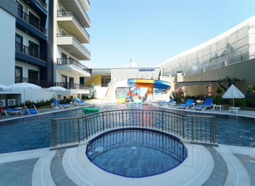 Двухкомнатная квартира в районе Махмутлар, Алания ID-19512 фото-18