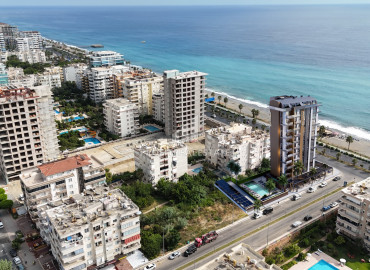 Апартаменты разных планировок, 82,1-205,3м², в элитном проекте на первой береговой линии в районе Алании – Махмутлар ID-19514 фото-1