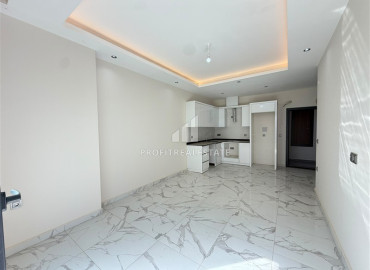 Квартира с одной спальней, 50м², с личным садом в новой элитной резиденции в Махмутларе, Алания ID-19520 фото-2