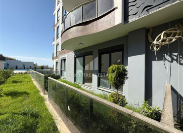 Квартира с одной спальней, 50м², с личным садом в новой элитной резиденции в Махмутларе, Алания ID-19520 фото-10